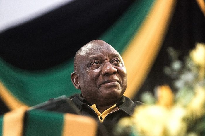 In this file photo taken on July 24, 2022 South Africa President Cyril Ramaphosa looks on prior to address delegates at the Olive Convention Centre in Durban. - President Cyril Ramaphosa was in talks with South Africa's ruling party late Thursday as pressure mounted for him to quit or be forced from office over a cash burglary at his farm that he allegedly covered up. (Photo by Rajesh JANTILAL / AFP)